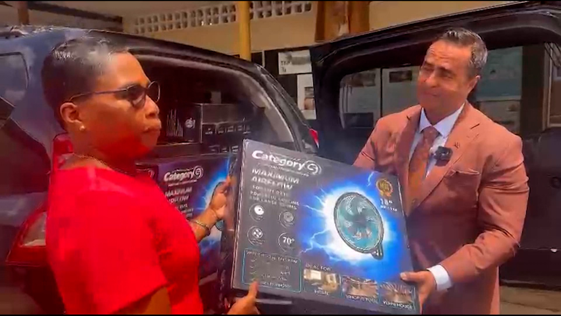 Minister Phillip Alexander Delivers 15 Fans To St Dominic’s RC School